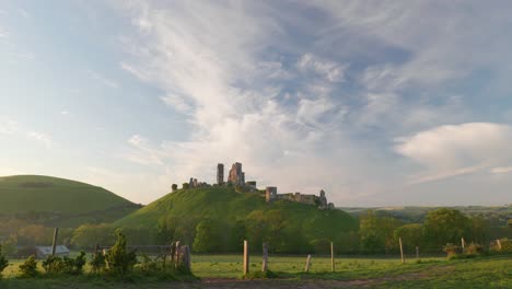 Stunning-view-of-Corfe-Castle-bathed-in-early-morning-light