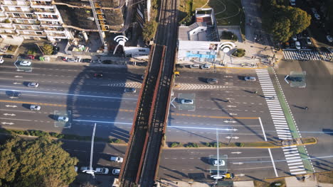 Aerial-top-down-shot-tracking-Autonomous-cars-on-highway-with-wireless-signals-----4K-Futuristic-motion-graphic-communication-connection-concept-with-gps