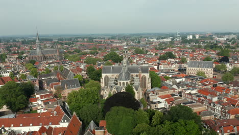 Beautiful,-quiet-city-of-Gouda-in-the-Netherlands--Aerial-reverse