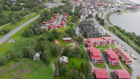 Aerial-Shot-Of-Dramatic-Landscape-Surrounding-A-Ski-Village-In-Sweden