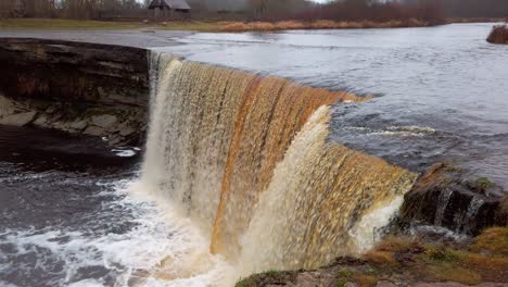Estonia,-beautiful-Jägala-Waterfall-from-top-view-on-a-cloudy-and-early-wintery-day