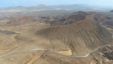 Aerial-drone-panning-footage-of-the-Calderón-Hondo-volcano-in-Fuerteventura-island