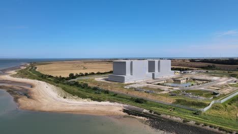 Bradwell-decommissioned-Nuclear-Power-station-Essex-UK-Aerial-footage-sunny-Summer-day