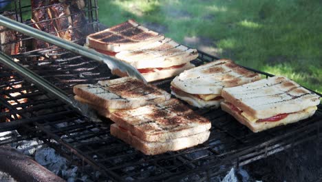 Cheese,tomato-and-onion-sandwiches-grilling-on-a-barbecue-in-South-Africa