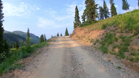 POV-driving-up-Alpine-Loop-4WD-trail,-near-Cinnamon-Pass-in-the-San-Juan-Mountains-near-Silverton-Colorado