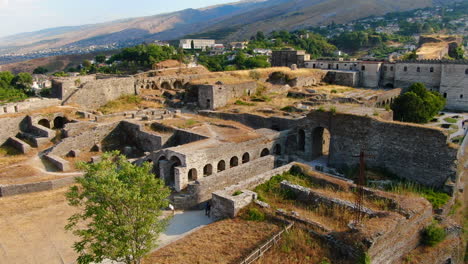 Drone-orbit-shot-4k-of-clock-of-Gjirokastra-castleGjirokastra-Castle-is-a-castle-in-Gjirokastra,-Albania