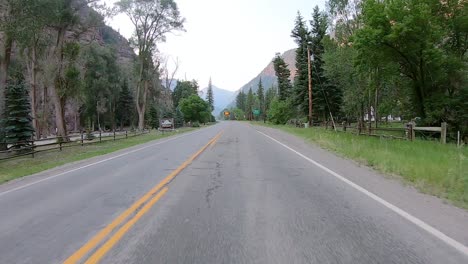 POV-while-driving-on-Highway-550-through-Uncompahgre-River-valley-near-Ouray-Colorado