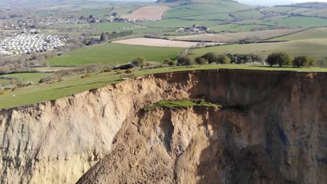 Aerial-View-Of-Massive-Rockfall-Debris-At-Seatown-In-Dorset