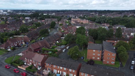 Suburban-Neighbourhood-residential-English-housing-estate-homes-aerial-view-panning-right