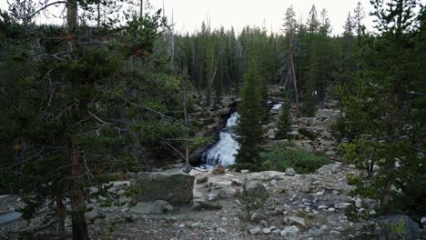 Wide-shot-of-the-beautiful-Provo-Falls-waterfall-in-the-Uinta-Wasatch-Cache-National-Forest-in-Utah-on-an-overcast-evening