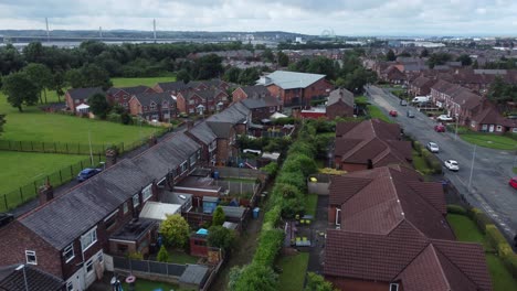 Suburban-Neighbourhood-residential-northern-British-housing-estate-homes-aerial-view-rising-pan-right