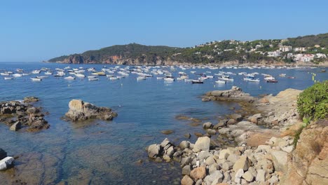 Beach-in-costa-brava-Calella-de-Palafrugell-Tamariu-Catalunya-Spain-fishing-village-Mediterranean-sea-transparent-turquoise-blue-waters-Paseo-de-Ronda