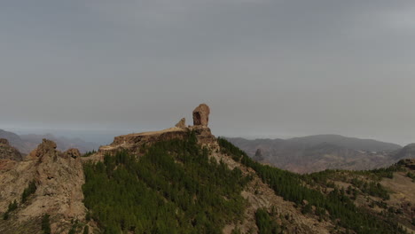 drone-close-up-shot-over-the-wonderful-Roque-Nublo-on-the-island-of-Gran-Canaria