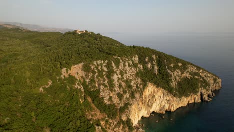 Rocky-cape-on-shore-of-Mediterranean-sea-with-panoramic-view-covered-in-green-vegetation-in-Albania