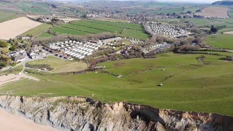 Aerial-View-Of-Seatown-Coastal-Hamlet-In-Dorset-Near-Jurassic-Coast