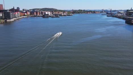 Speedboat-Cruising-At-Gota-River-In-Gothenburg,-Sweden-At-Daytime