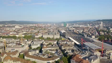 Panoramic-Aerial-Shot-of-Switzerland's-Largest-City,-Zurich-on-Beautiful-Summer-Day