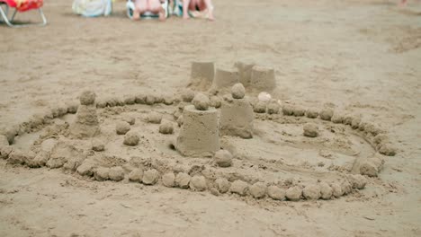 Close-Up-Of-Simple-Sand-Castle-Structure-At-The-Beach-In-Summer