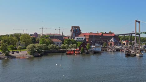 Coastal-Building-Beside-The-Alvborg-Bridge-Over-The-Gota-River-In-Gothenburg,-Sweden