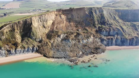 Aerial-View-Of-Massive-Jurassic-Coast-Cliff-Fall-At-Seatown-In-Dorset