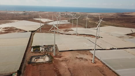 Wonderful-shot-of-drone-in-orbit-of-wind-turbines-in-a-wind-farm-on-the-island-of-Gran-Canaria,-Canary-Islands