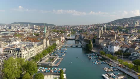 Beautiful-Aerial-View-of-Zurich,-Switzerland-Along-the-Limmat-River-on-Summer-Day