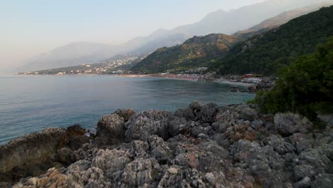 Rocky-coastline-revealing-beautiful-beaches-and-touristic-resorts-in-Mediterranean,-Albania