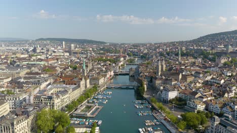Slow-Aerial-Dolly-Over-Limmat-River-in-Downtown-Zurich,-Switzerland