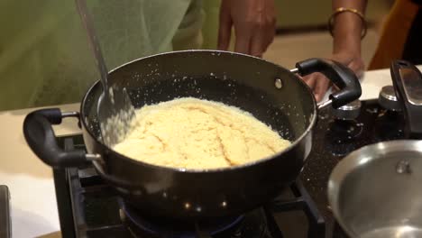 Making-shira-indian-sweet-for-pooja-rituals-and-added-some-milk