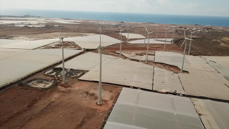 Wonderful-shot-of-drone-in-orbit-of-wind-turbines-in-a-wind-farm-on-the-island-of-Gran-Canaria,-Canary-Islands