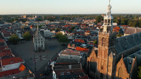 Aerial-View-Of-The-Sint-Jan-Church-Near-The-Market-Square-In-Gouda-City,-South-Holland,-Netherlands