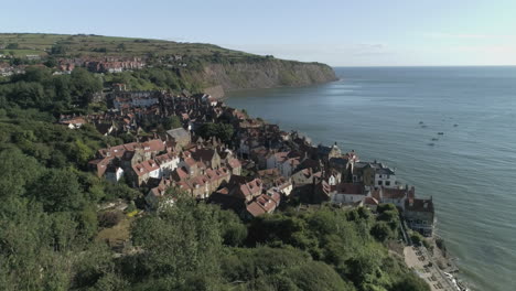 North-York-Moors,-Robin-Hoods-Bay,-RHB,-Clip-1,-Drone-Over-town-and-coast,-North-Yorkshire-Heritage-Coast,-Video,-3840x2160-25fps,-Prores-422