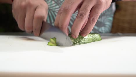 chef-cutting-zucchini-in-slow-motion