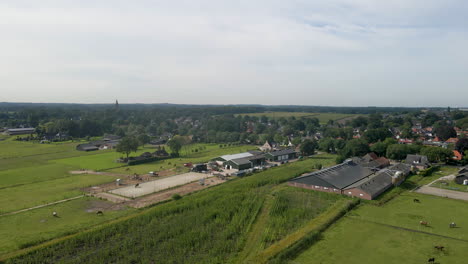 Aerial-view-of-large-farms-at-the-edge-of-rural-town