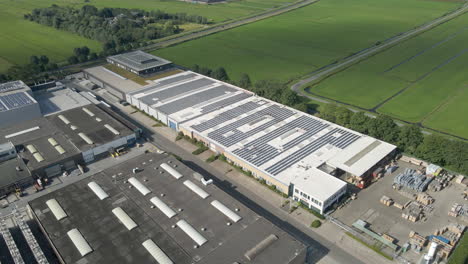 Beautiful-aerial-of-solar-panels-on-rooftop-of-industrial-building
