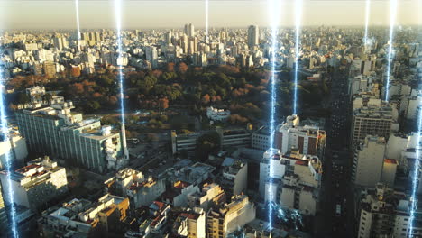 Aerial-drone-shot-of-future-concept-with-glowing-digital-lines-connecting-city---Beautiful-nature-park-with-trees-surrounded-by-buildings-and-skyscrapers-of-Buenos-Aires---Prores-footage