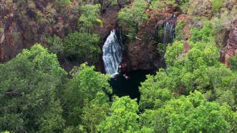 Aerial-View-Of-Tourists-At-Florence-Falls,-Karrimurra-With-Lush-Green-Forest-Within-Litchfield-National-Park-In-Northern-Territory,-Australia