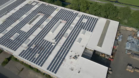 Jib-up-of-industrial-building-filled-with-solar-panels
