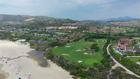 Spinning-aerial-view-of-Monarch-Beach-Golf-course-in-Dana-Point,-California