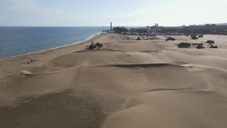 Aerial-view-of-Maspalomas-sand-dunes-at-sunset,-Gran-Canaria,-Canary-islands,-Spain