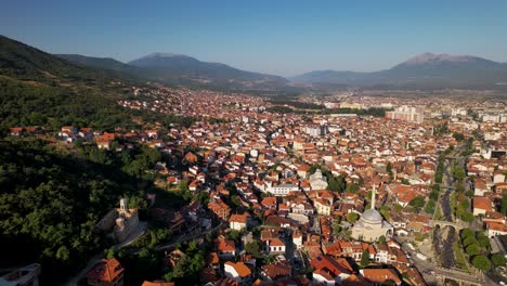 Famous-neighborhood-of-Cahirja-in-Prizren-city,-traditional-houses,-hotels-and-restaurants-near-the-river
