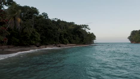Deep-Blue-Ocean-With-Dense-Forest-At-Punta-Mona-Island-In-Caribbean-Coast-Of-Costa-Rica