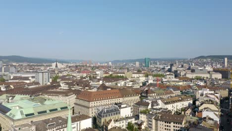 Ascending-Aerial-View-of-Zurich's-Famous-Old-Town-in-Switzerland's-Largest-City