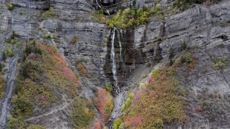 Bridal-Veil-Falls-Waterfall-Cascading-on-Mountain-Cliff's-in-Provo-Canyon,-Utah---Aerial-Approach
