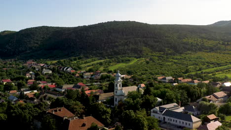 Rotating-cinematic-drone-shot-town-near-the-Boldogkő-Castle-in-Hungary