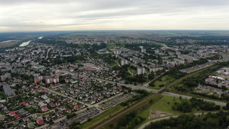 Beautiful-cityscape-of-Jonava-city-in-Lithuania,-high-angle-drone-view