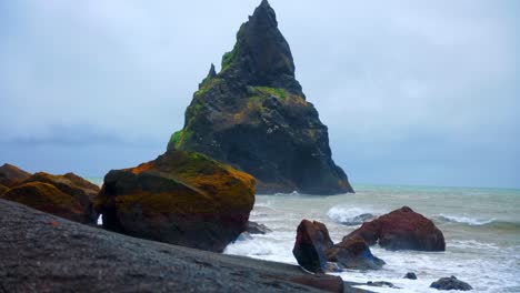 Enormous-Basalt-Stacks-At-The-Famous-Black-Sand-Beach-of-Reynisfjara-In-South-Coast-Of-Iceland