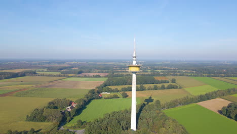 Broadcast-Tower-On-The-Scenic-Landscape-Of-Dotternhausen-In-Germany---aerial-drone-shot