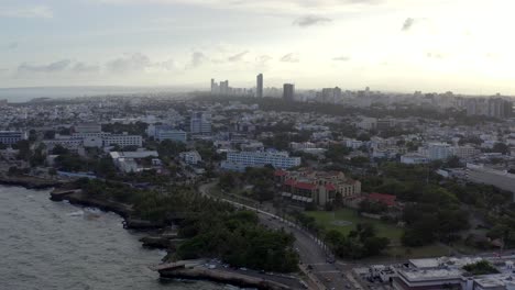 Aerial-drone-forward-on-coast-along-Malecon-in-Santo-Domingo