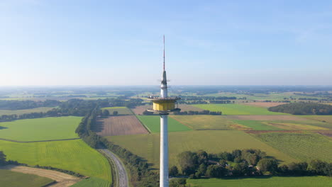 Radio-And-TV-Tower-On-The-Idyllic-Field-In-Dotternhausen,-Germany---aerial-drone-shot